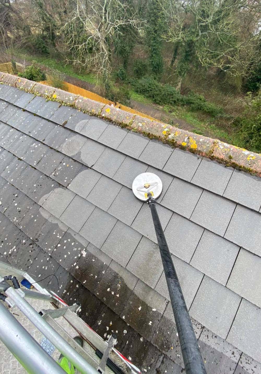 Power washing moss off roof